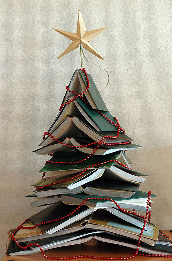 a beautiful christmas tree made out of books